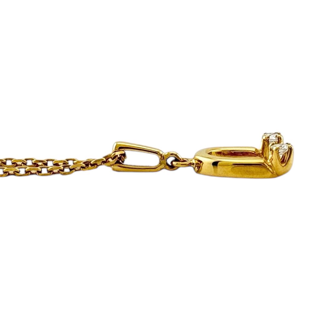 Mikimoto ladies necklace in 18K yellow gold featuring a diamond, weighing approximately 2.6g