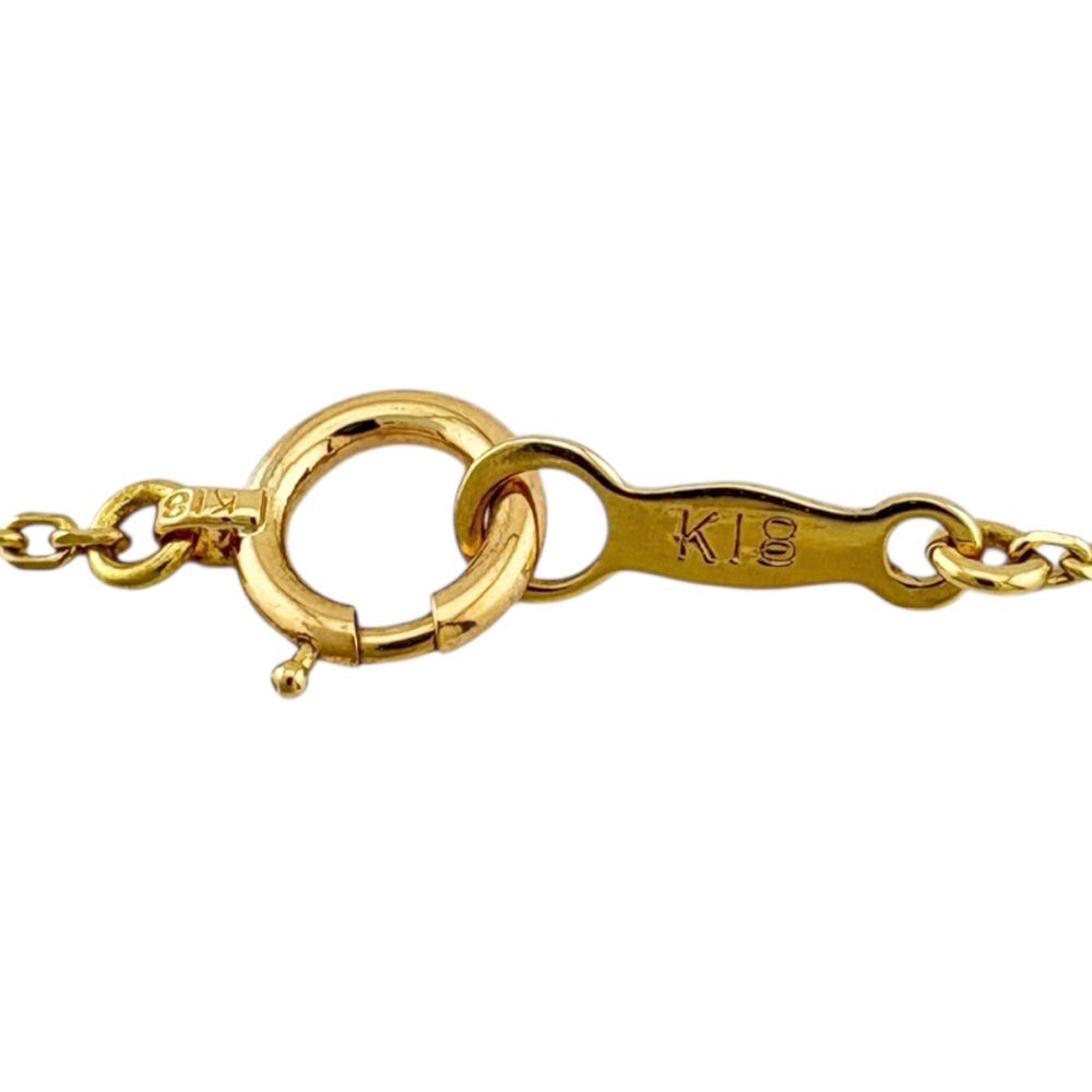Mikimoto ladies necklace in 18K yellow gold featuring a diamond, weighing approximately 2.6g