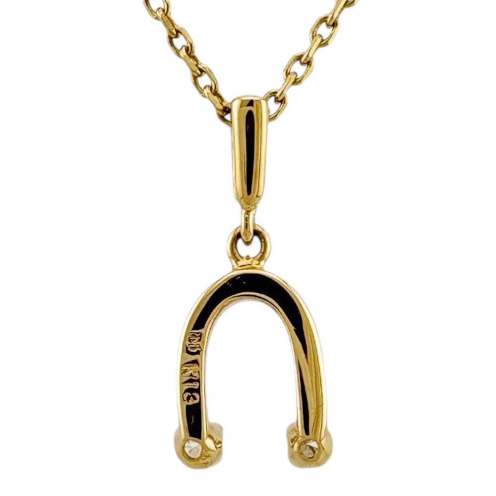 Mikimoto ladies necklace in 18K yellow gold featuring a diamond, weighing approximately 2.6g