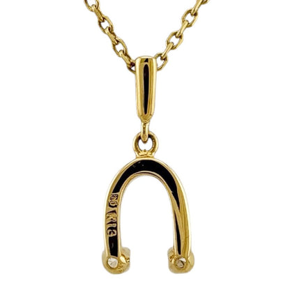 Mikimoto ladies necklace in 18K yellow gold featuring a diamond, weighing approximately 2.6g