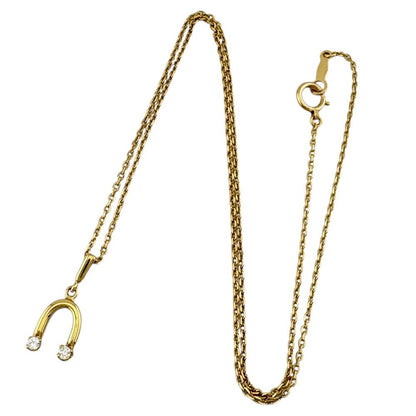 Mikimoto ladies necklace in 18K yellow gold featuring a diamond, weighing approximately 2.6g