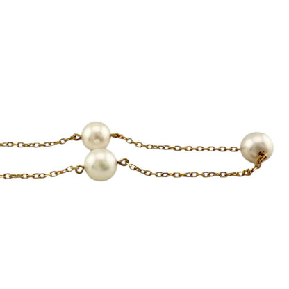Mikimoto ladies necklace with 18K yellow gold chain and single Akoya pearl pendant weighing 3.9 grams