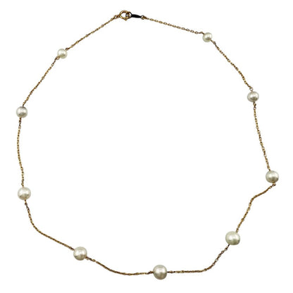 Mikimoto ladies necklace with 18K yellow gold chain and single Akoya pearl pendant weighing 3.9 grams