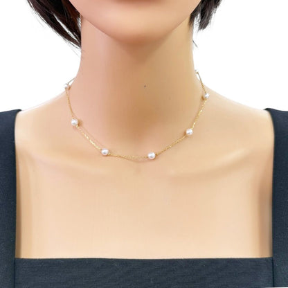 Mikimoto ladies necklace with 18K yellow gold chain and single Akoya pearl pendant weighing 3.9 grams