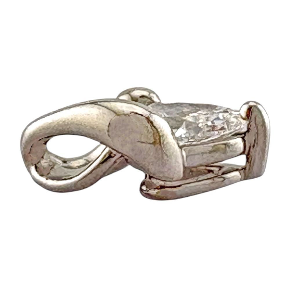 Tasaki platinum pendant top with 0.30 carat diamond, measuring 7.0 mm by 10.5 mm, delicate ladies jewelry