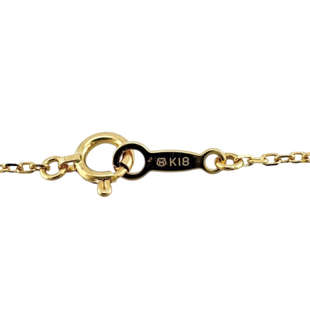 Mikimoto ladies 18K yellow gold cross necklace with diamond detail and K18 stamp on clasp