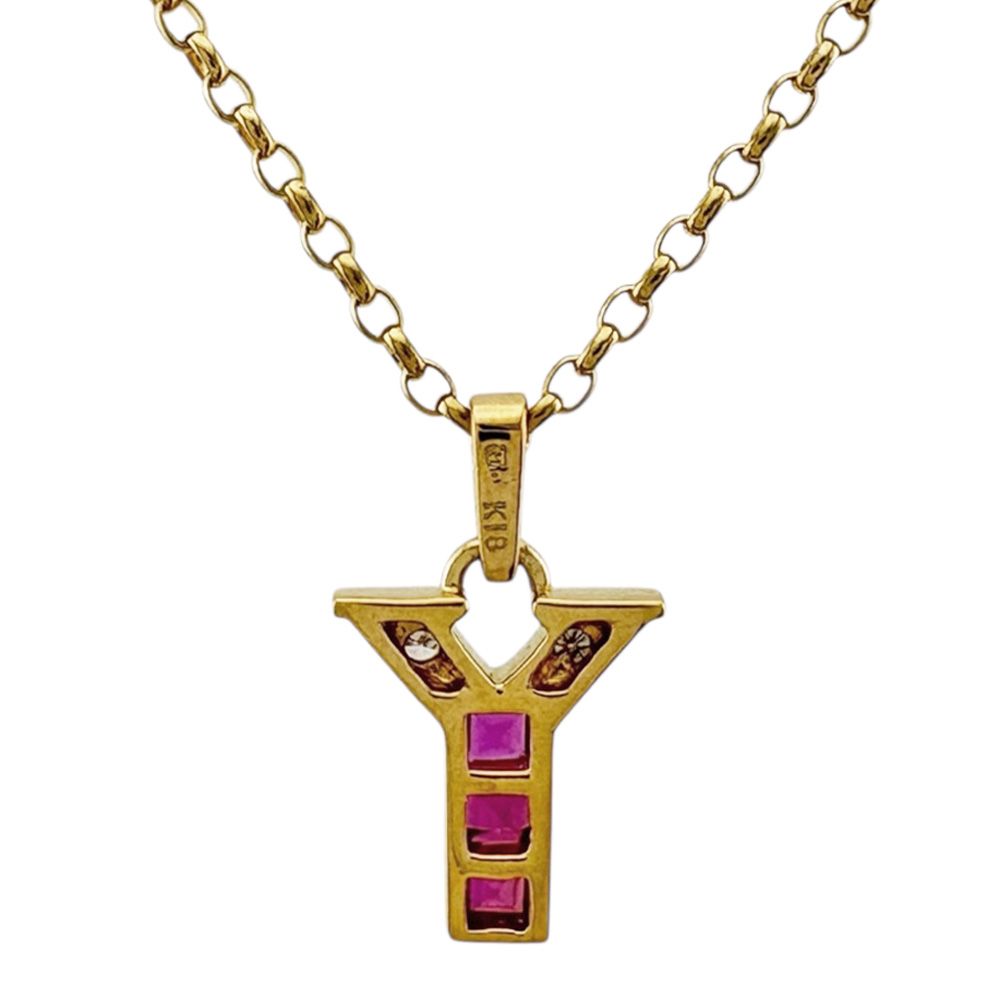 Mikimoto 18K yellow gold necklace featuring a ruby pendant for ladies