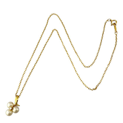 Mikimoto ladies necklace in 18K yellow gold featuring a single pearl weighing 3.1 grams