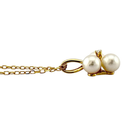 Mikimoto ladies necklace in 18K yellow gold featuring a single pearl weighing 3.1 grams