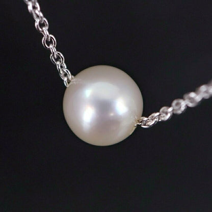 Tasaki pearl necklace with a single 6.4mm silver pearl on a 41cm adjustable silver chain