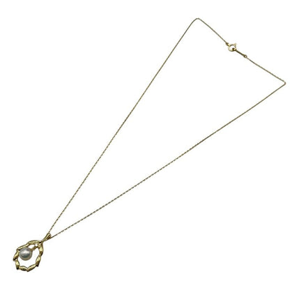 Mikimoto K18 gold ladies necklace with pearl and diamond stones, 23.3 mm length and 15.2 mm width