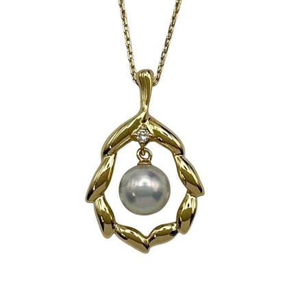 Mikimoto K18 gold ladies necklace with pearl and diamond stones, 23.3 mm length and 15.2 mm width