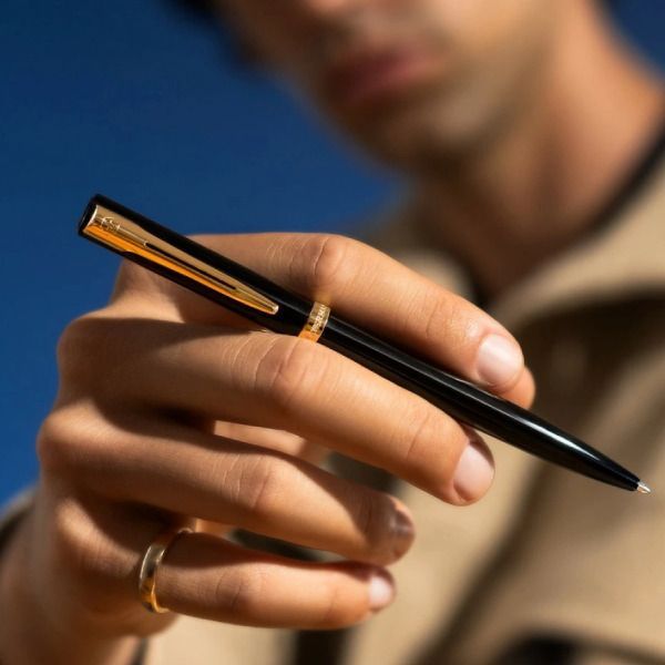 WATERMAN Impression Black GT ballpoint pen with fine point, gold coating trim, and glossy lacquer stainless steel body