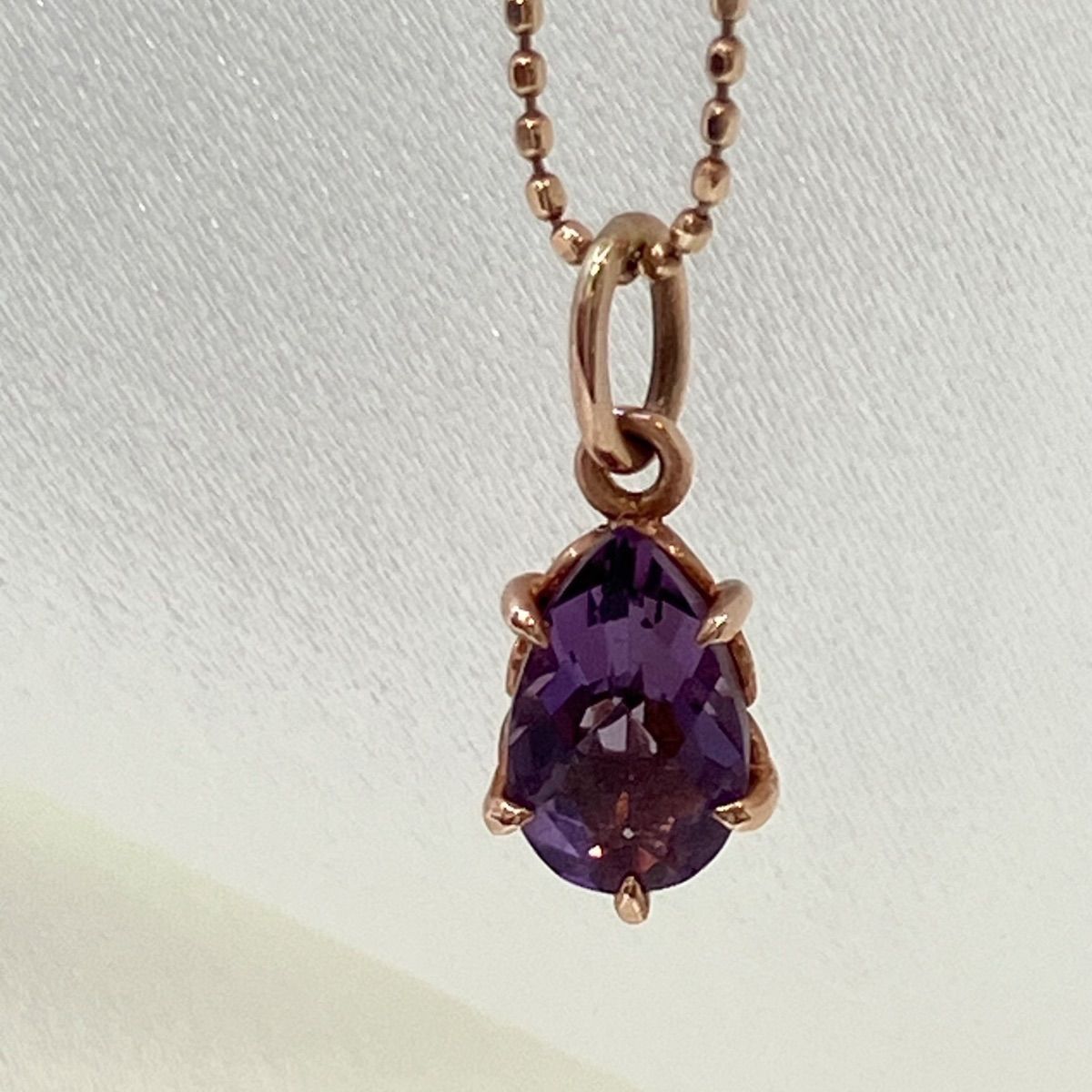 agete10K necklace with purple amethyst stone in 10K rose gold weighing 1.6 grams with included box