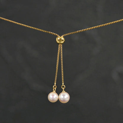 Tasaki Aoyama Pearl Slide Necklace featuring 6.0 to 6.5 mm pearls with K18YG gold chain, 49 cm long