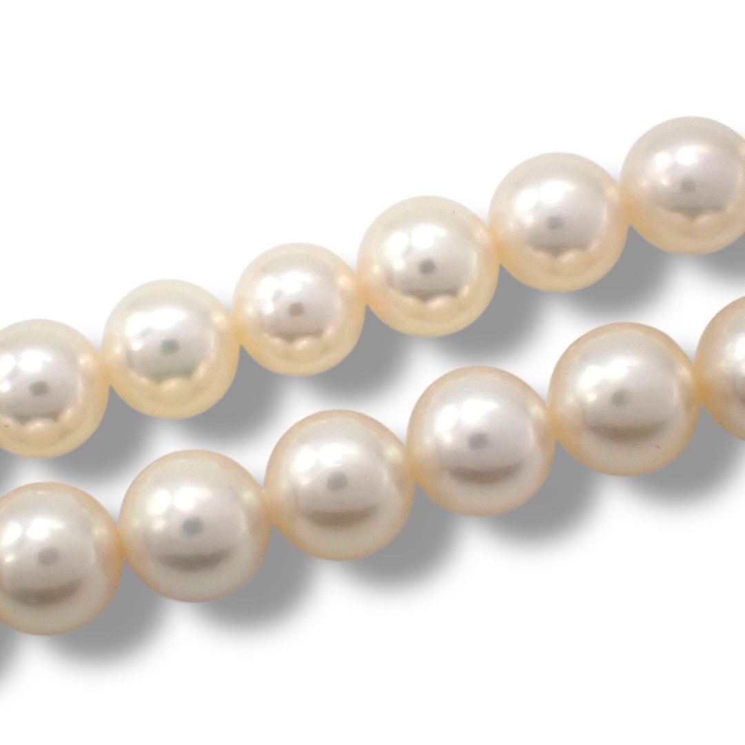 Tasaki Pearl 6.0-7.7mm pearl necklace and matching earrings two-piece set