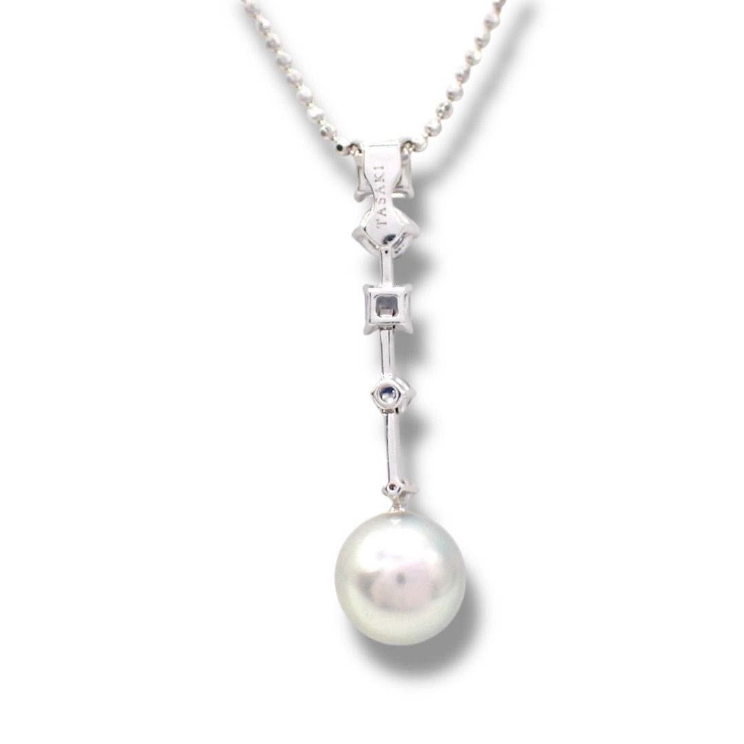 Tasaki pearl necklace with drop pendant featuring diamonds and colored gemstones on a white gold chain