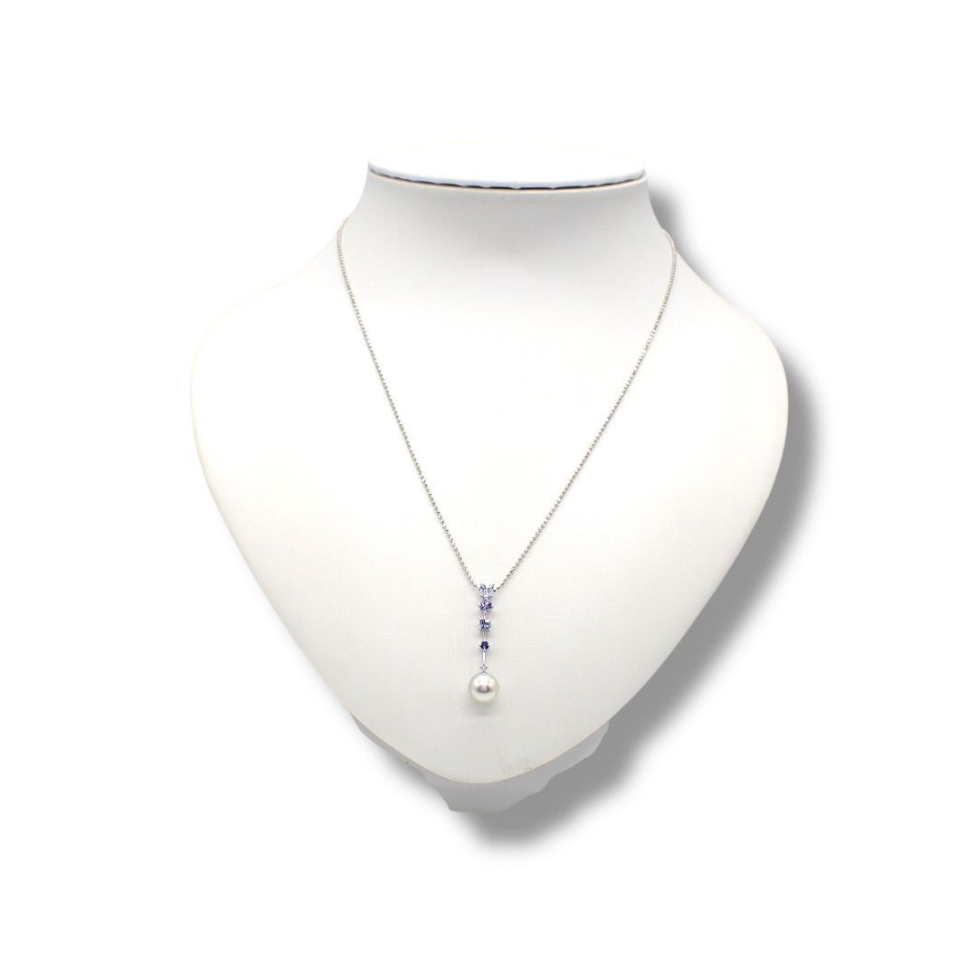 Tasaki pearl necklace with drop pendant featuring diamonds and colored gemstones on a white gold chain