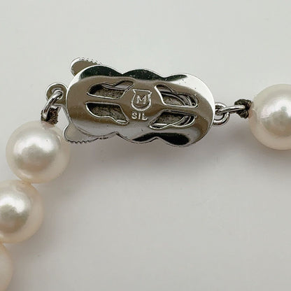 MIKIMOTO Necklace featuring 7mm pearls measuring 43 cm in length with a polished finish