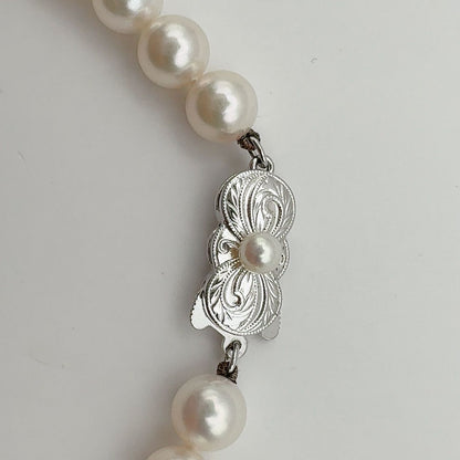 MIKIMOTO Necklace featuring 7mm pearls measuring 43 cm in length with a polished finish