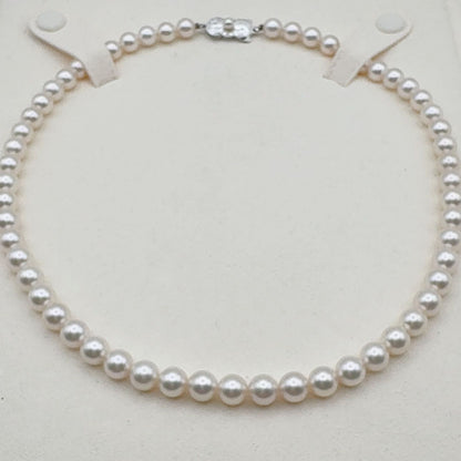 MIKIMOTO Necklace featuring 7mm pearls measuring 43 cm in length with a polished finish