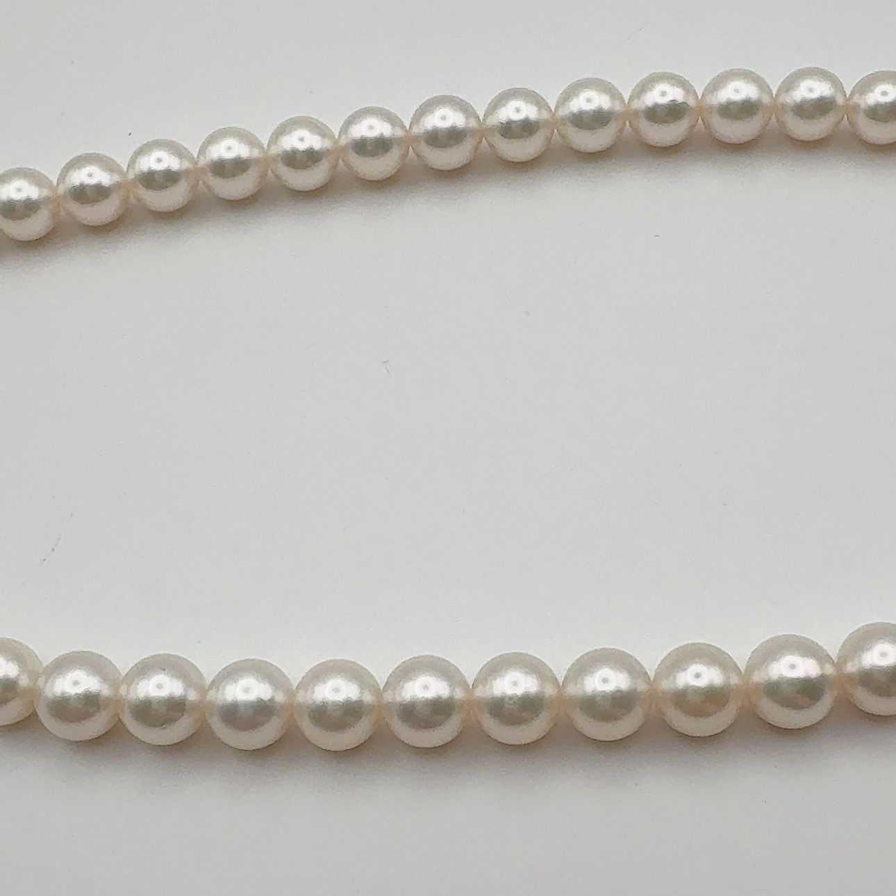 MIKIMOTO Necklace featuring 7mm pearls measuring 43 cm in length with a polished finish