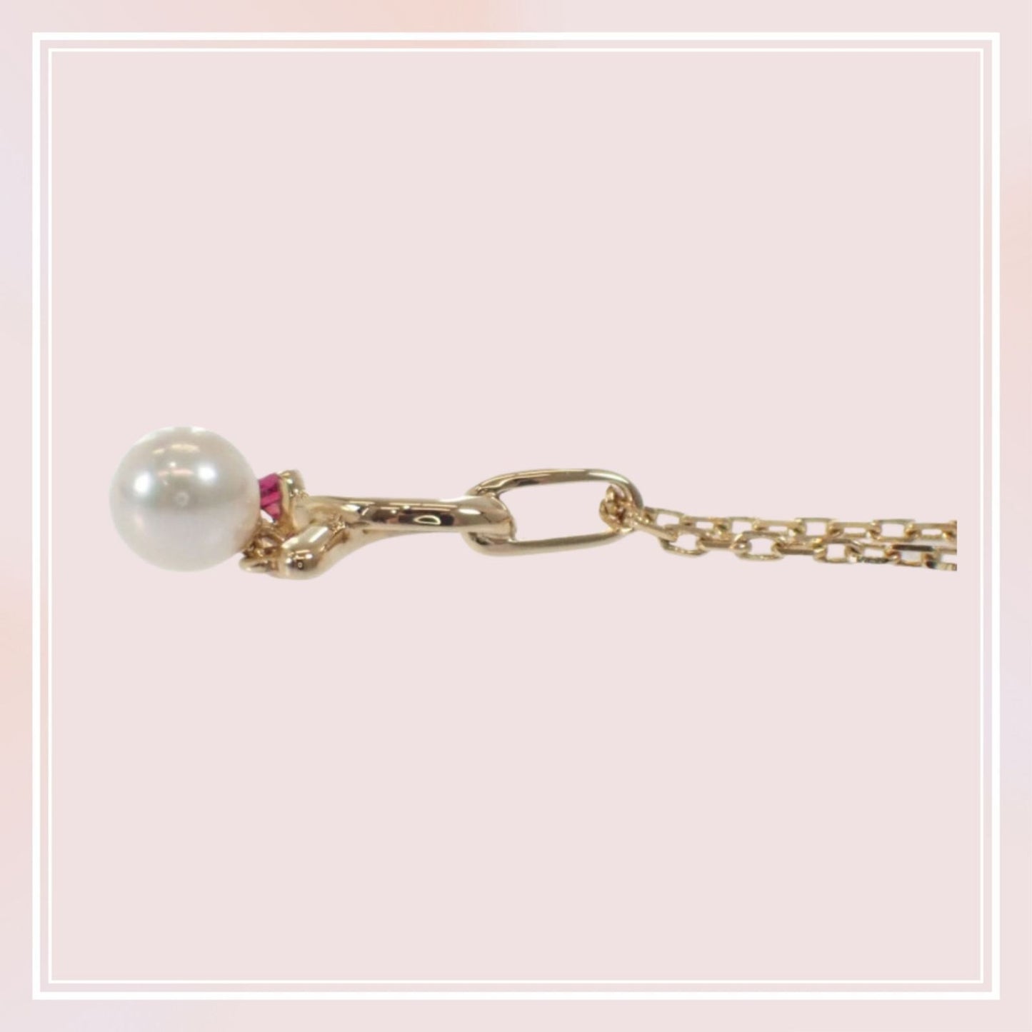 Mikimoto 18K yellow gold pendant necklace with ruby and 5.1mm Akoya pearl on 38cm chain displayed with box