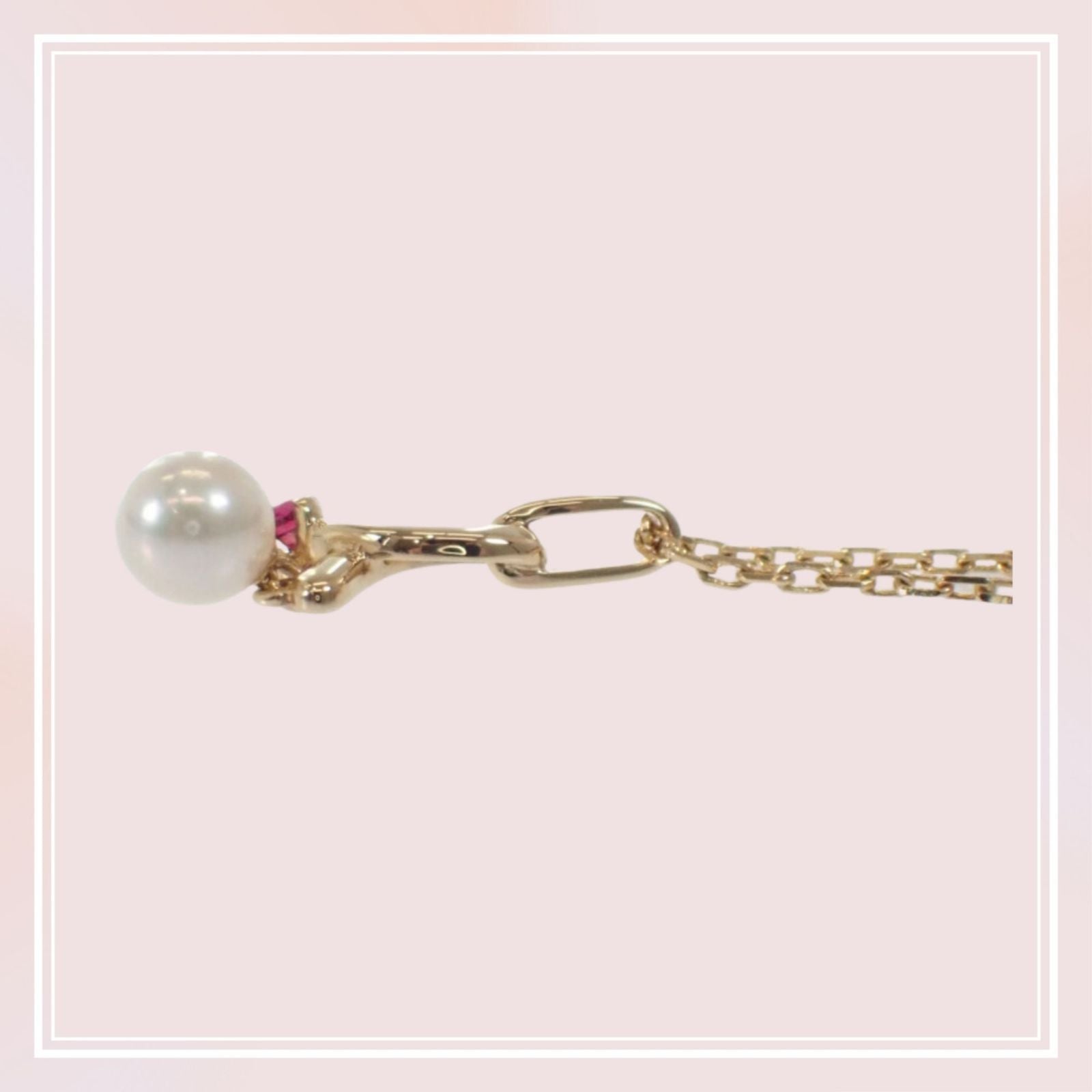 Mikimoto 18K yellow gold pendant necklace with ruby and 5.1mm Akoya pearl on 38cm chain displayed with box