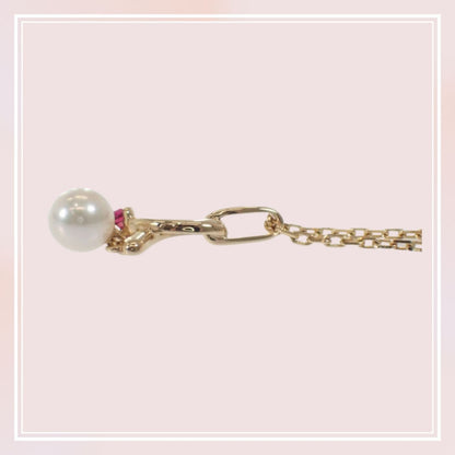 Mikimoto 18K yellow gold pendant necklace with ruby and 5.1mm Akoya pearl on 38cm chain displayed with box