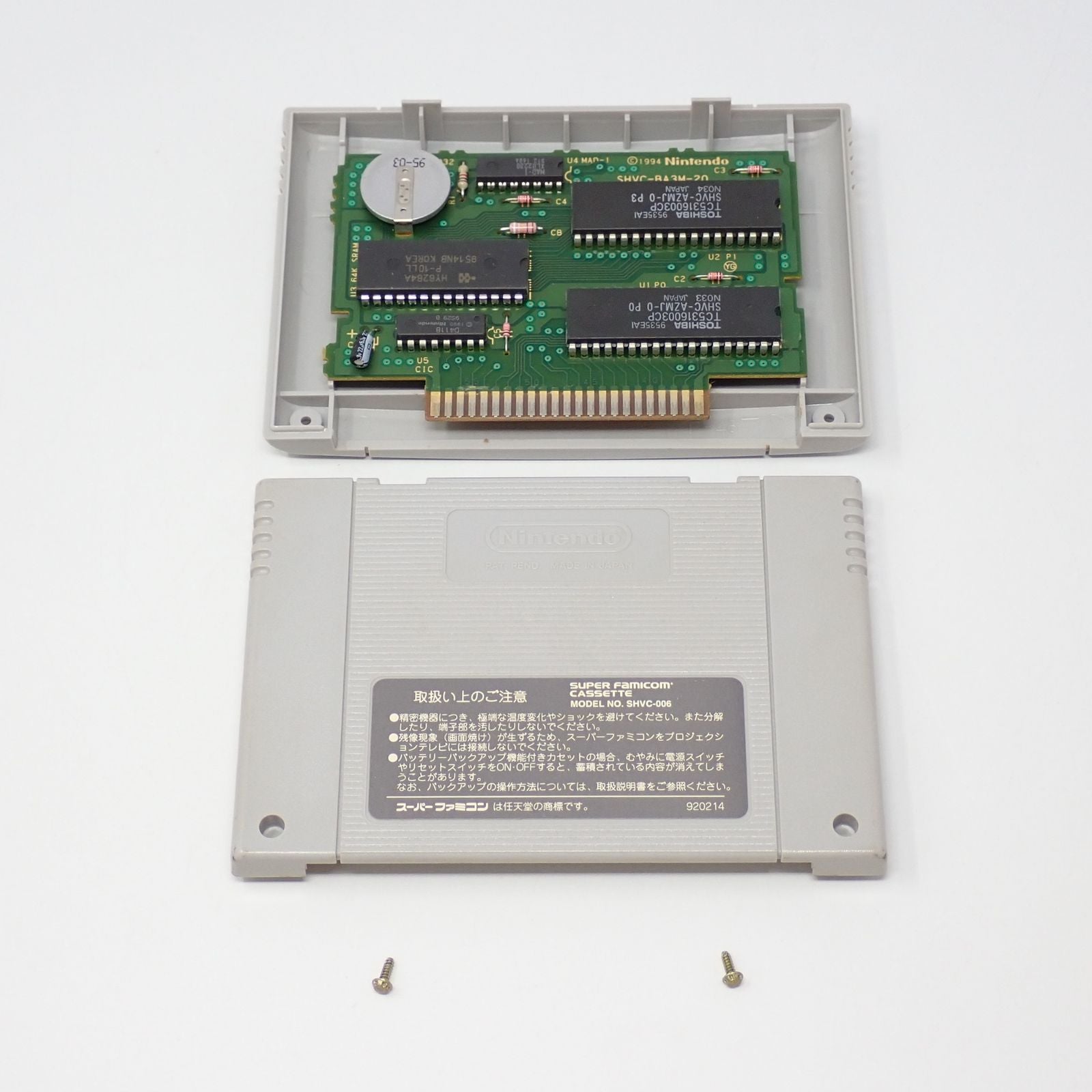 Meta Max Returns SNES game cartridge with original box, manual, and postcard in used condition
