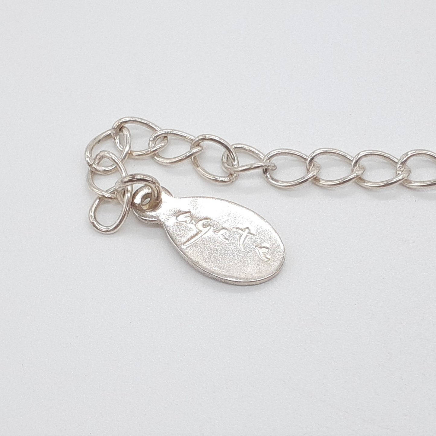 Agete silver necklace featuring a Cauldron stone pendant on a 37 cm adjustable chain