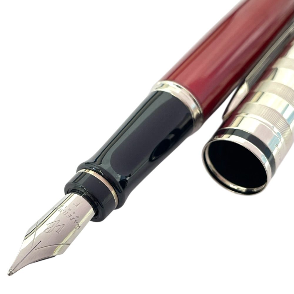 Waterman Expert Fountain Pen with a 14 cm length, sleek black body, and silver accents shown on white background