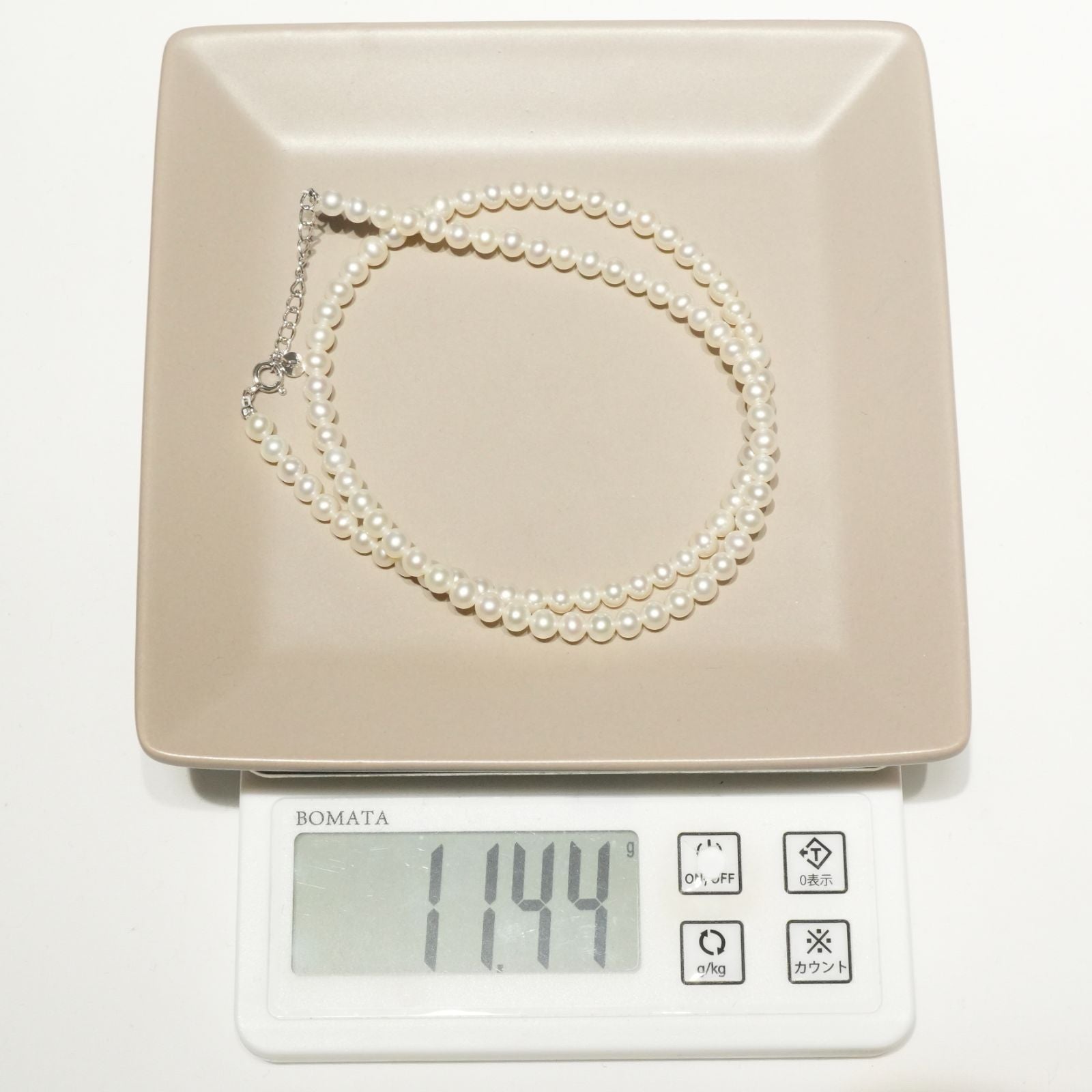 Mikimoto Baby Pearl Necklace in white gold K18WG featuring delicate pearls on a fine chain
