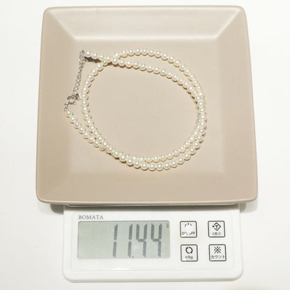 Mikimoto Baby Pearl Necklace in white gold K18WG featuring delicate pearls on a fine chain