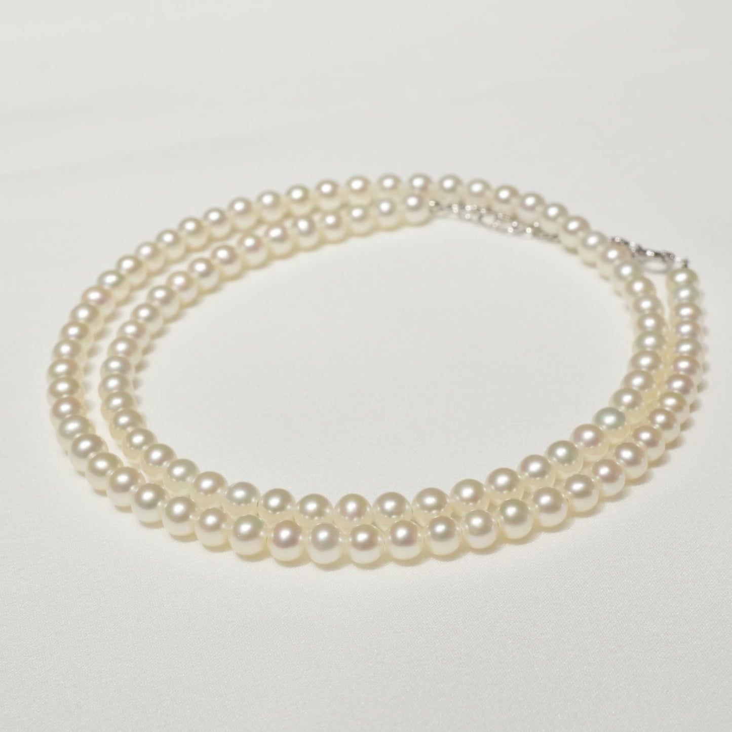 Mikimoto Baby Pearl Necklace in white gold K18WG featuring delicate pearls on a fine chain