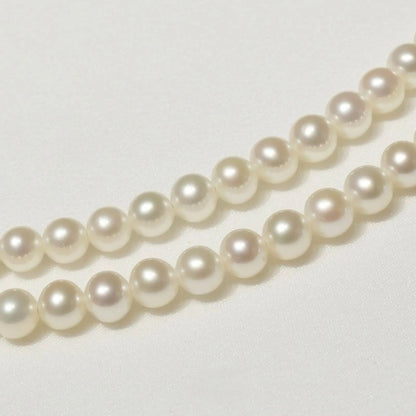 Mikimoto Baby Pearl Necklace in white gold K18WG featuring delicate pearls on a fine chain