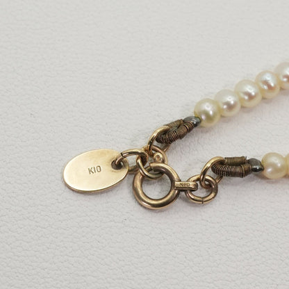 Agete K10 Pearl Long Necklace 25-2801 featuring delicate pearl accents on a fine gold chain