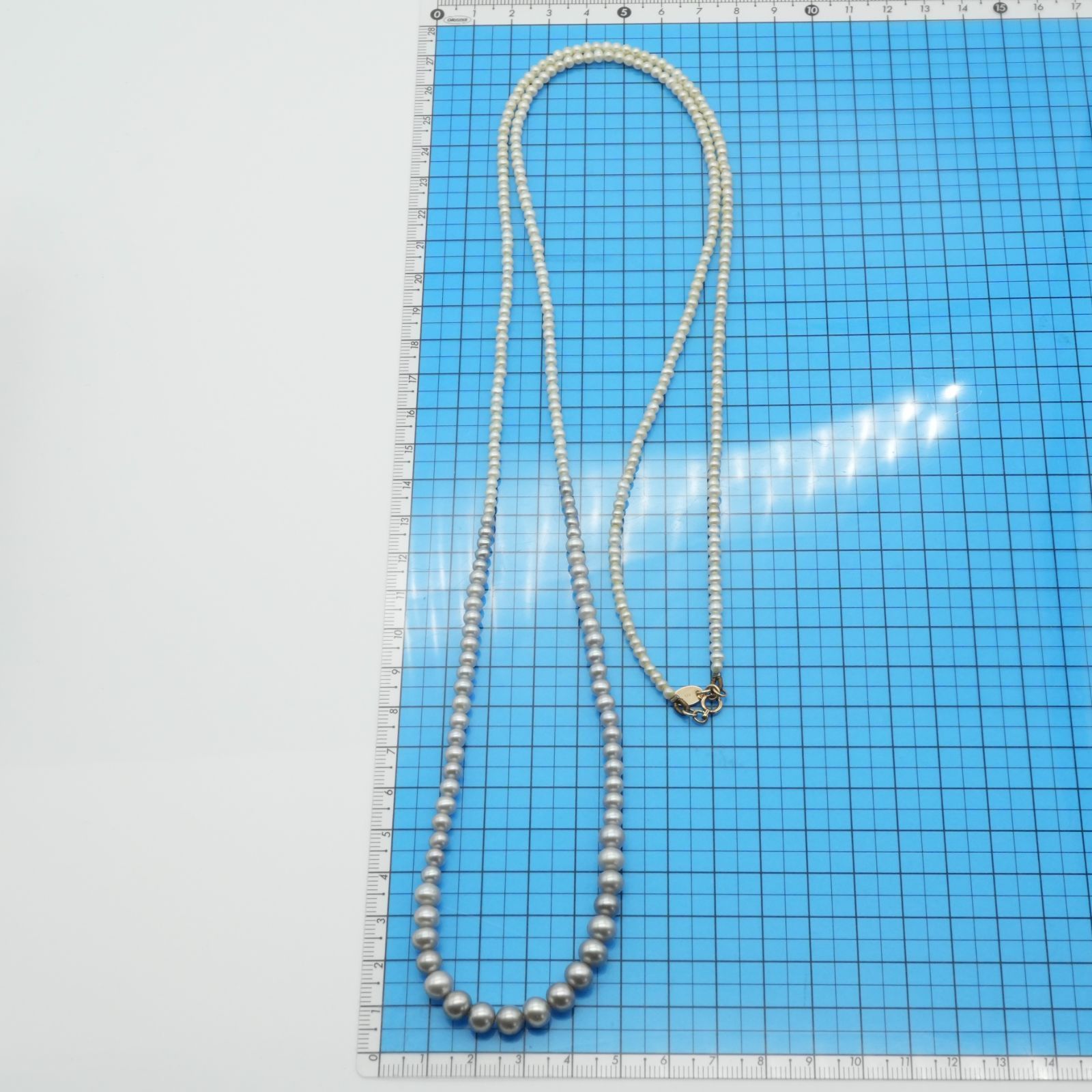 Agete K10 Pearl Long Necklace 25-2801 featuring delicate pearl accents on a fine gold chain