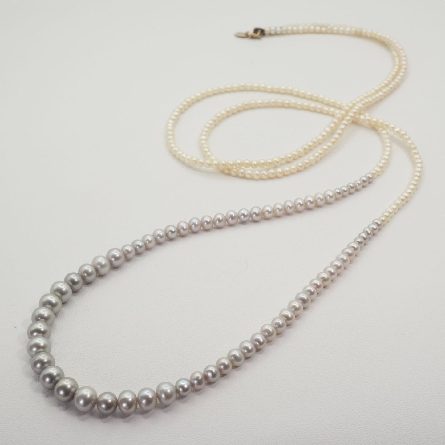 Agete K10 Pearl Long Necklace 25-2801 featuring delicate pearl accents on a fine gold chain