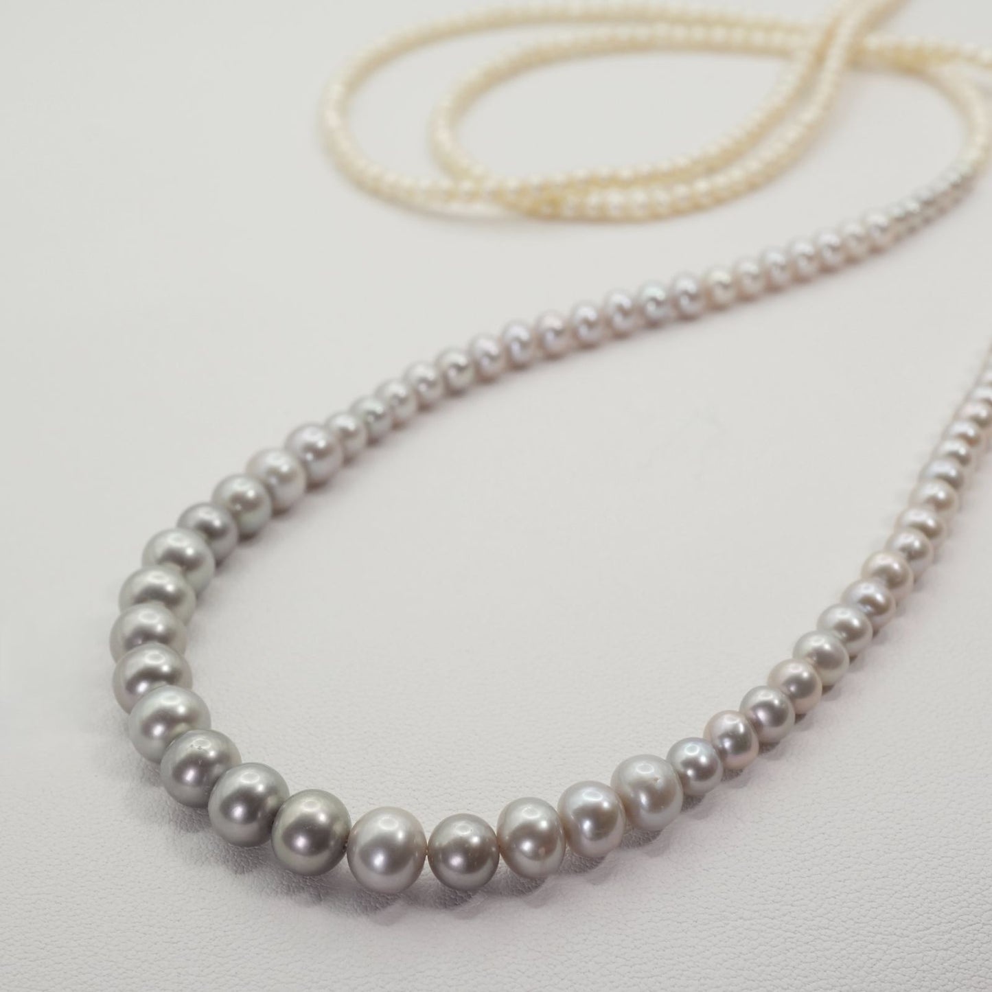 Agete K10 Pearl Long Necklace 25-2801 featuring delicate pearl accents on a fine gold chain