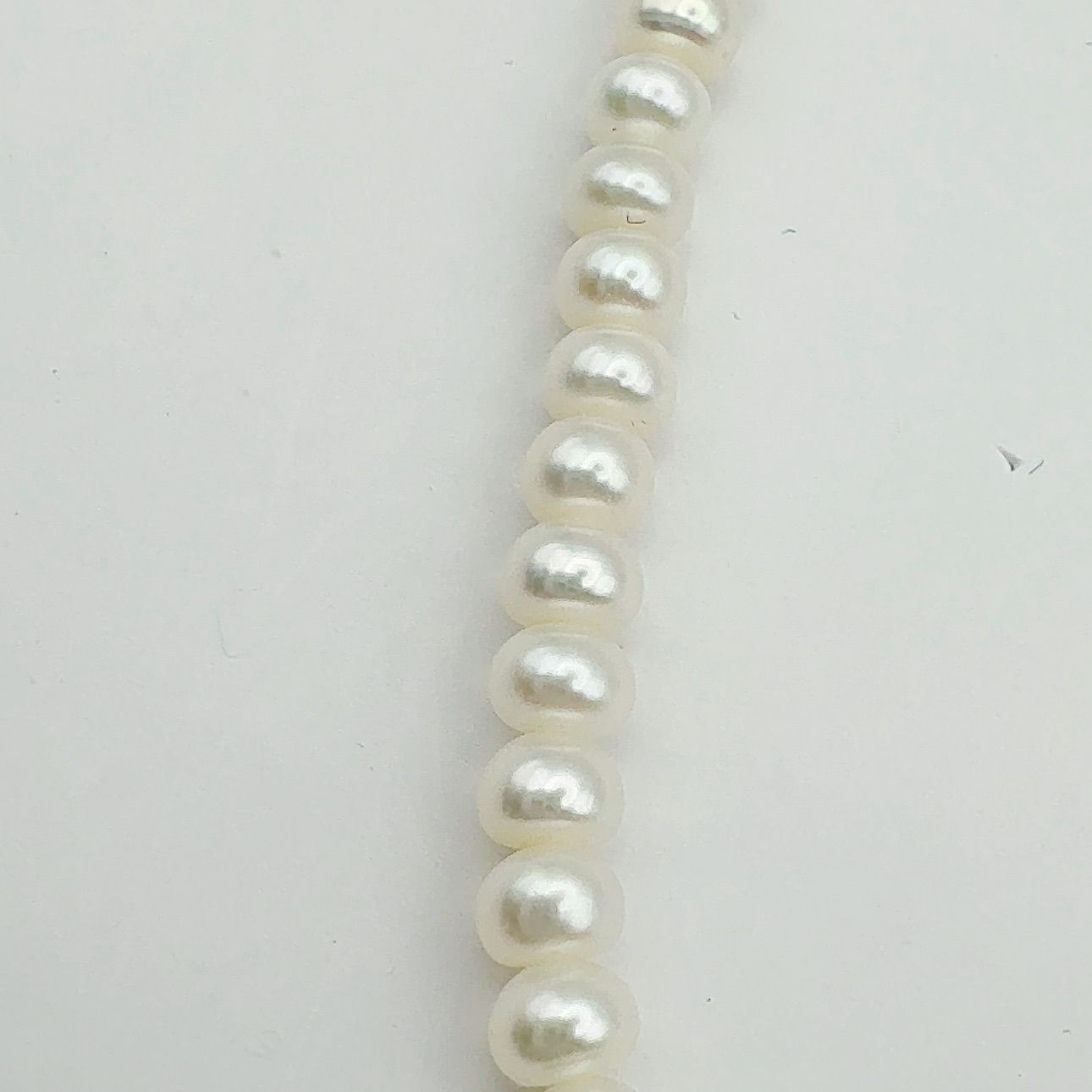 MIKIMOTO freshwater pearl necklace with 3x5mm pearls and K18 gold clasp measuring 42cm in length