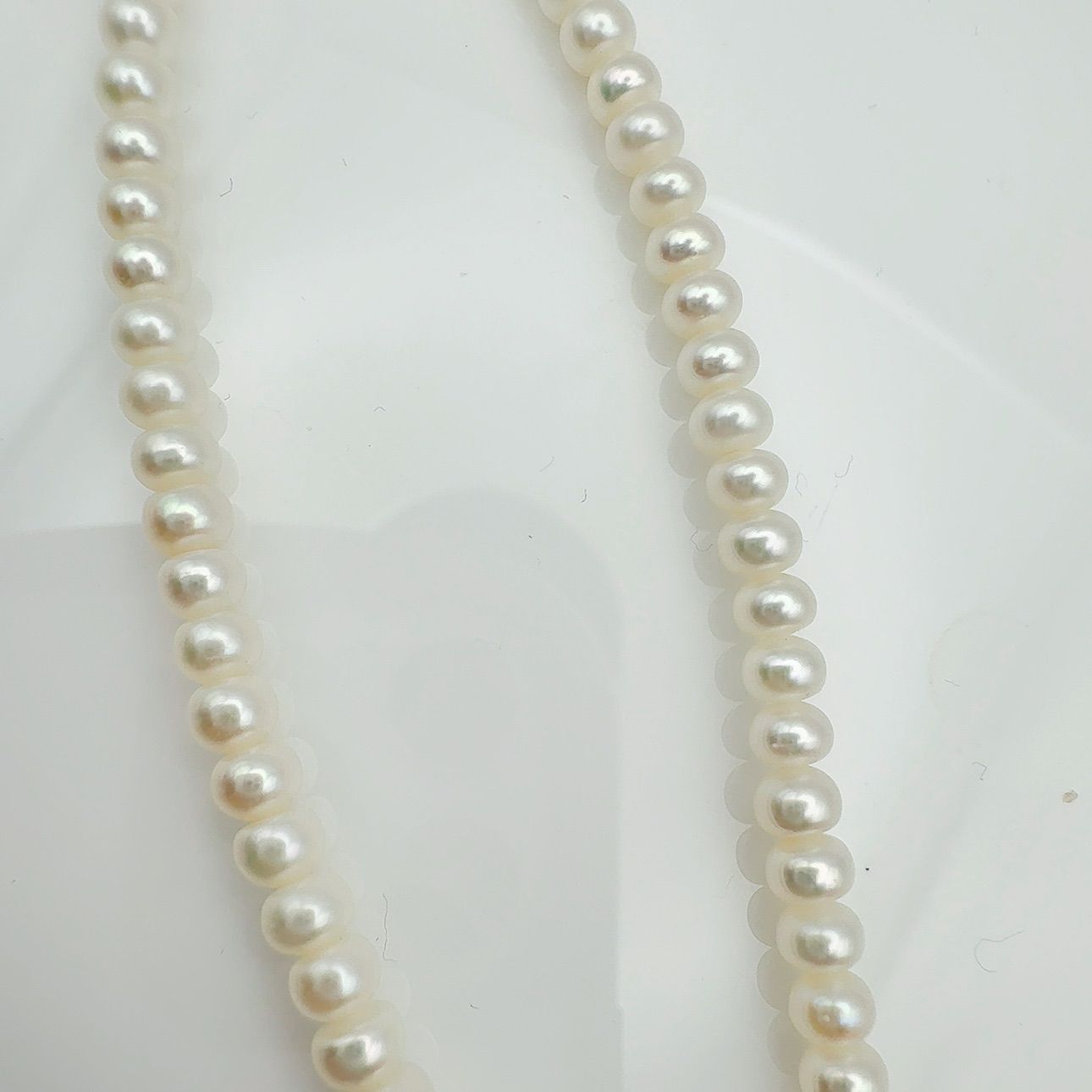 MIKIMOTO freshwater pearl necklace with 3x5mm pearls and K18 gold clasp measuring 42cm in length