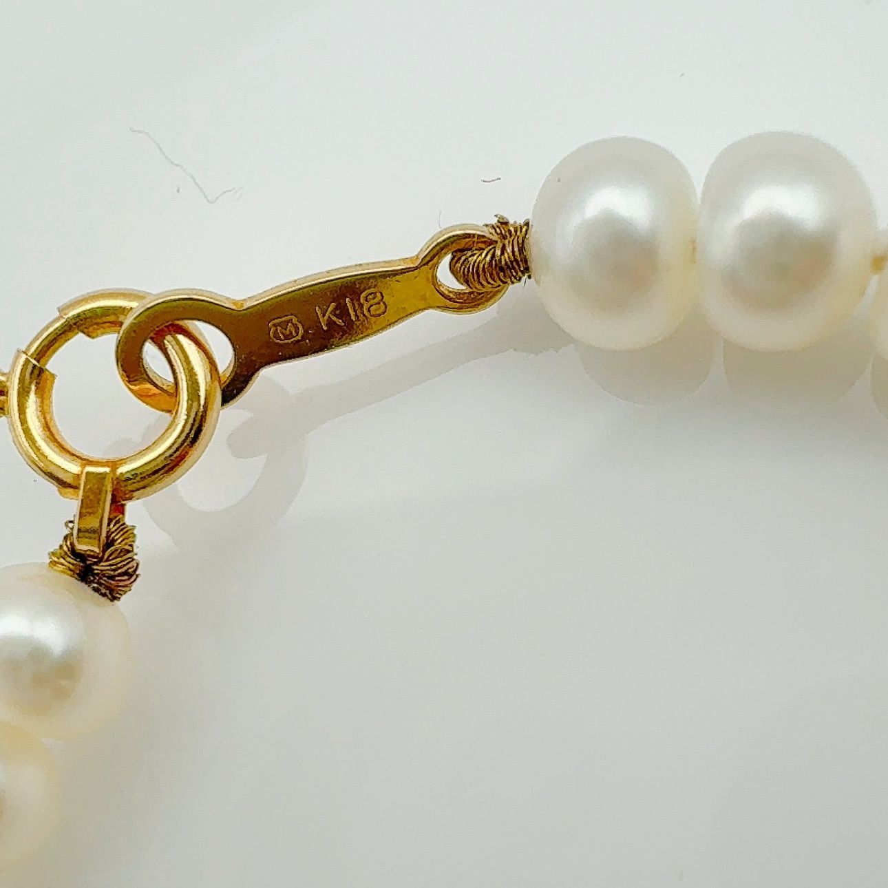 MIKIMOTO freshwater pearl necklace with 3x5mm pearls and K18 gold clasp measuring 42cm in length