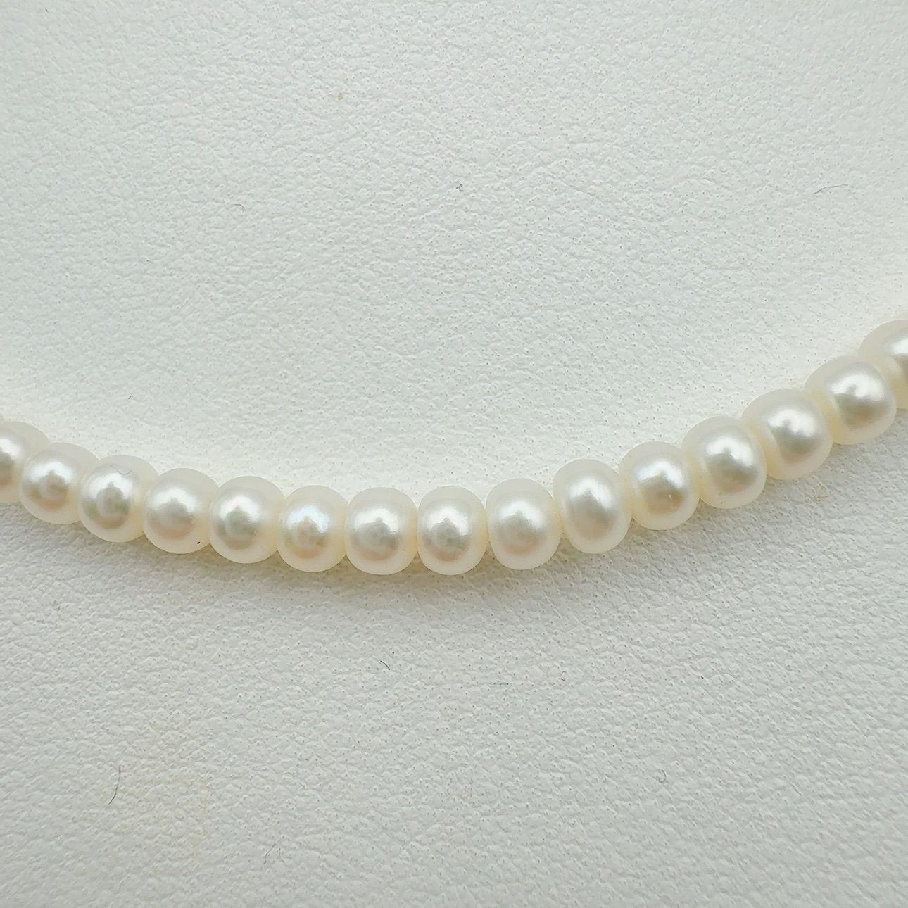MIKIMOTO freshwater pearl necklace with 3x5mm pearls and K18 gold clasp measuring 42cm in length