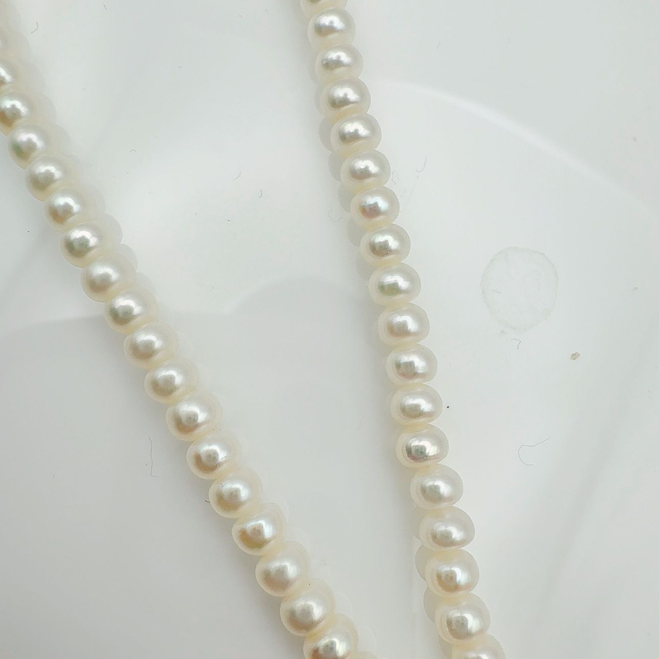 MIKIMOTO freshwater pearl necklace with 3x5mm pearls and K18 gold clasp measuring 42cm in length