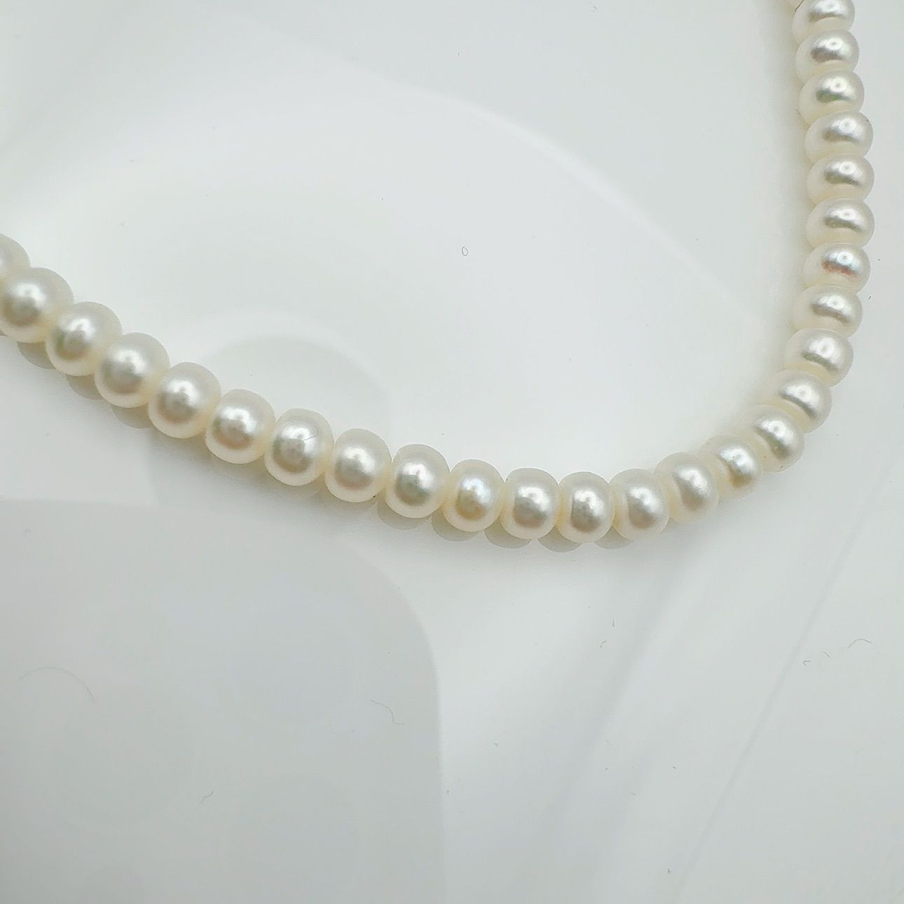 MIKIMOTO freshwater pearl necklace with 3x5mm pearls and K18 gold clasp measuring 42cm in length
