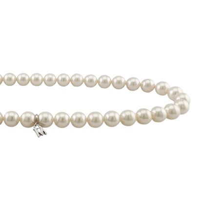 Mikimoto silver pearl necklace for ladies with elegant design, weighing 32.7 grams