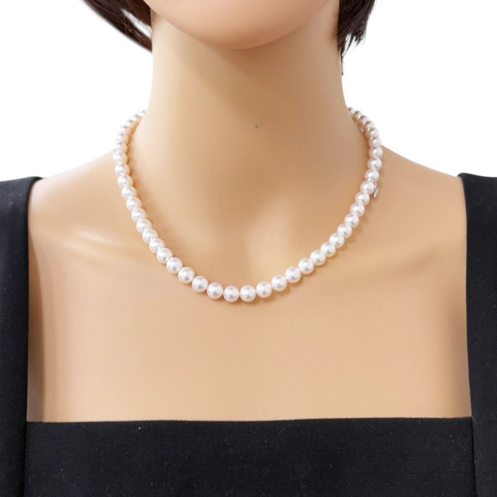 Mikimoto silver pearl necklace for ladies with elegant design, weighing 32.7 grams