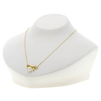 MIKIMOTO ladies ribbon motif pearl necklace in 18K yellow gold with 7.1mm pearl and 40cm chain