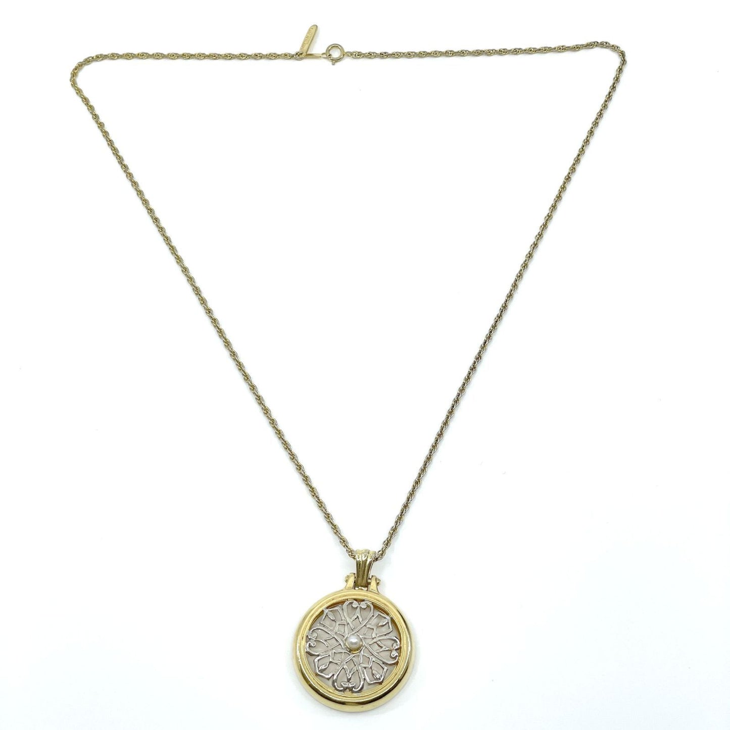 Mikimoto Loupe Pendant Necklace featuring a pearl magnifier on a 64 chain with moderate scratches